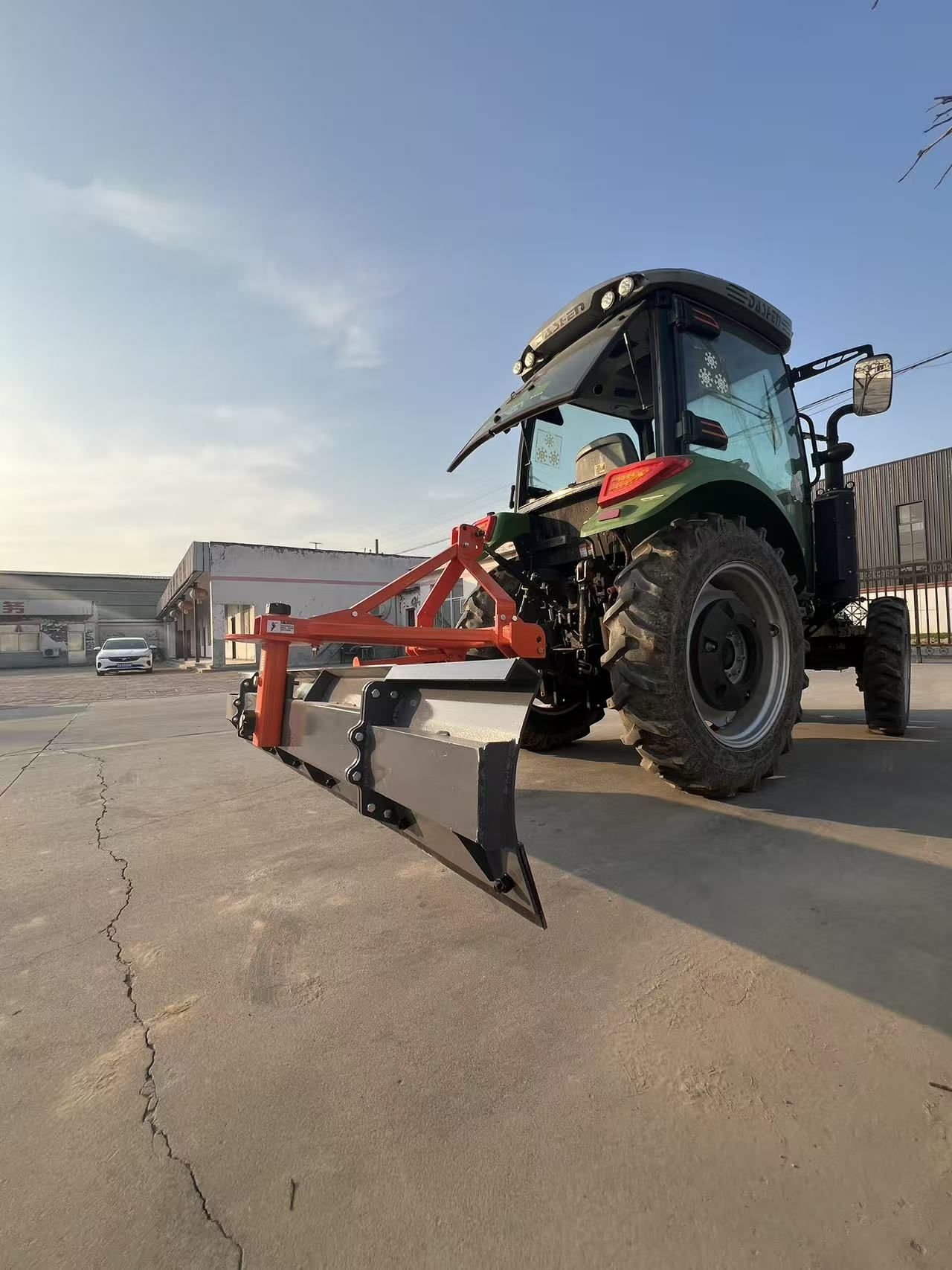 Three-point hitch scraper grader